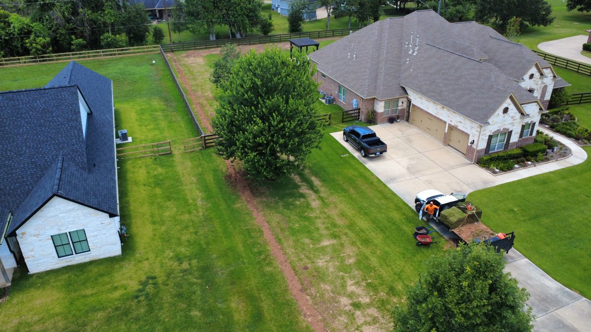 Aerial view of a finished, regraded backyard — Richmond, TX